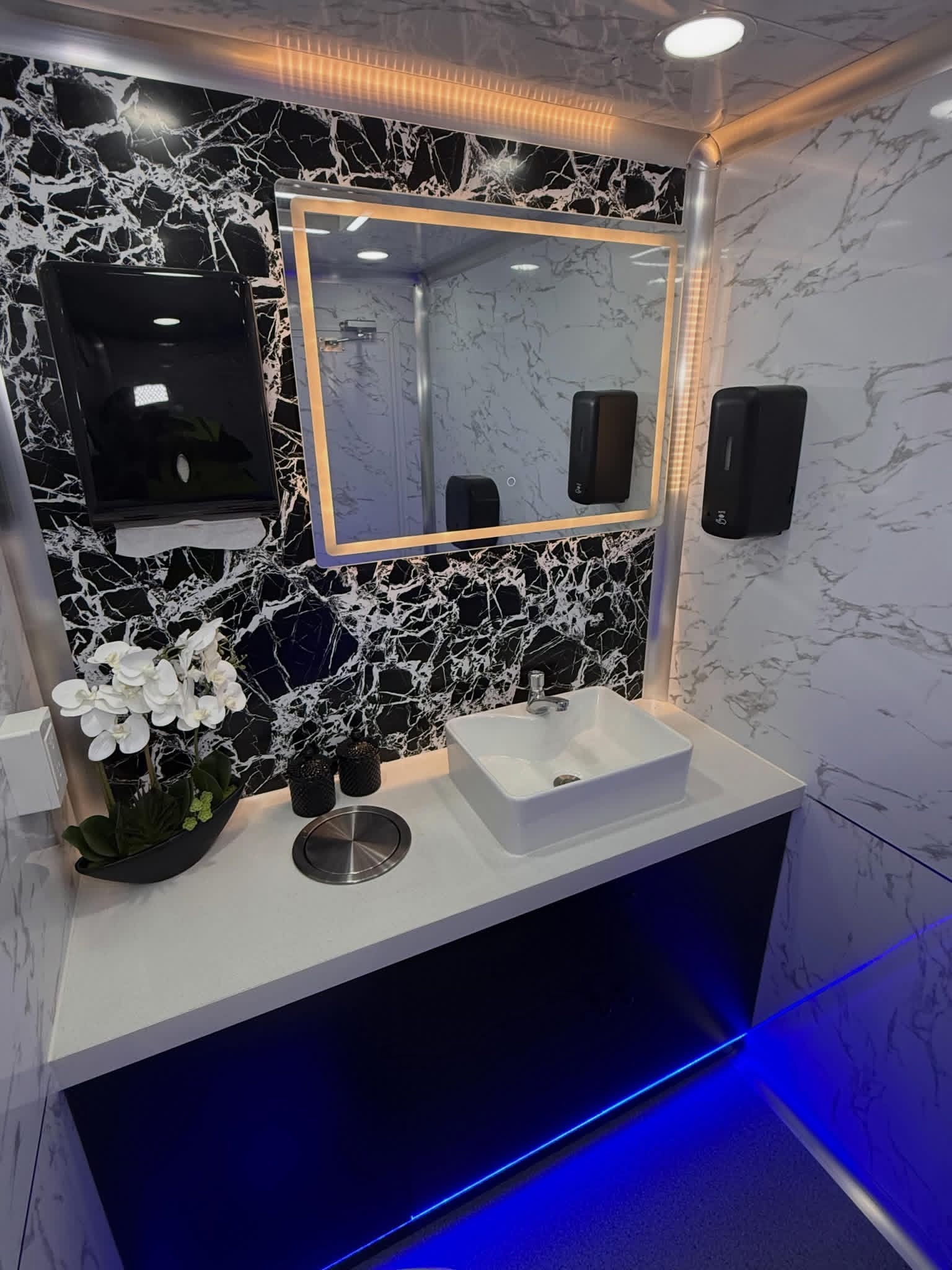 Luxury restroom trailer vanity with LED mirror
